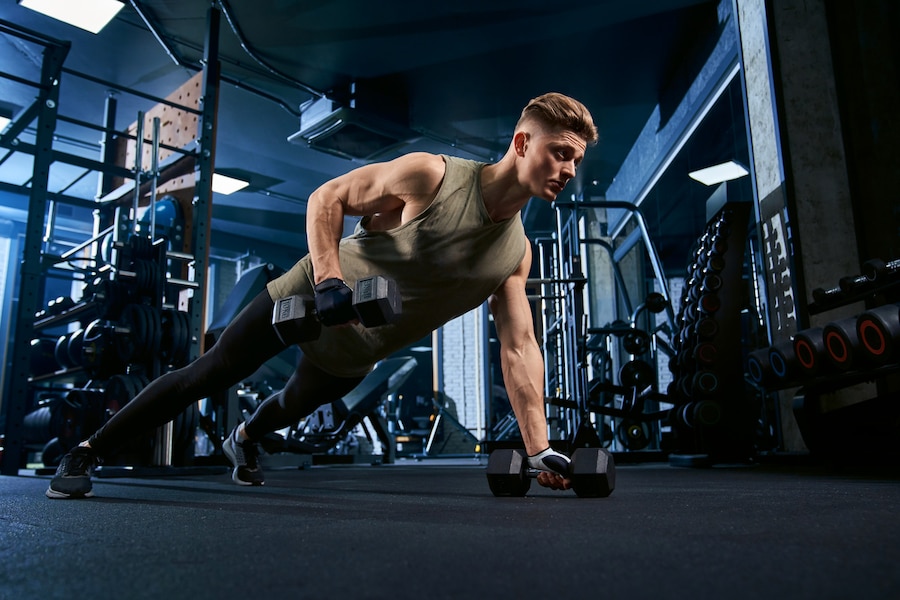 muscular-man-doing-push-ups-one-hand